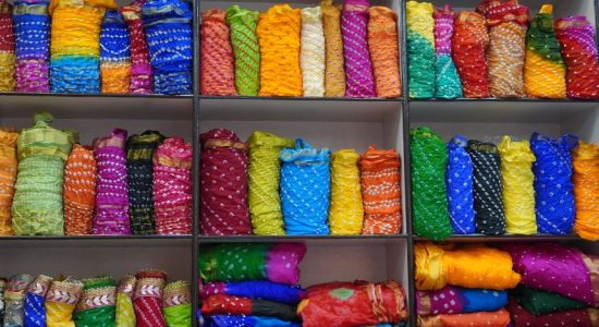 What Role Does Fabric Play in Rajasthani Traditional Clothing?
