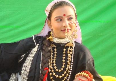 What Accessories and Ornaments Accompany Garhwali Dress?